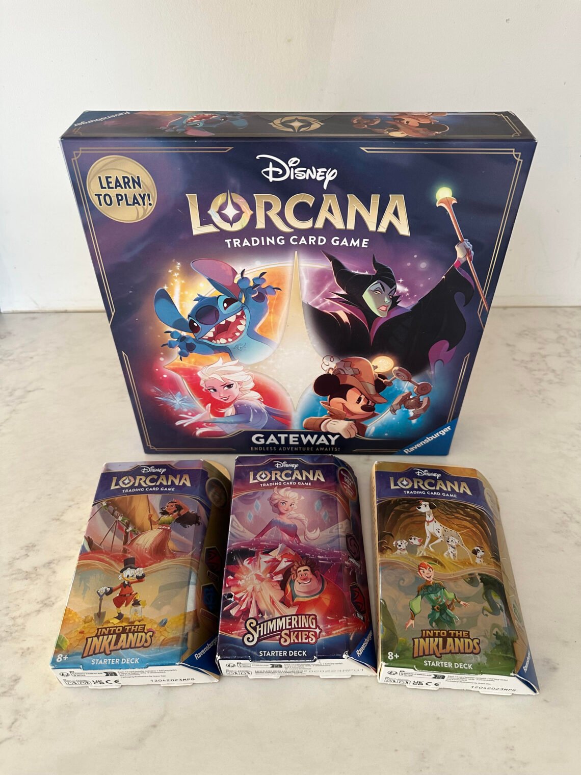 Disney Lorcana Gateway box set and 3 starter decks to get you right into the game play!